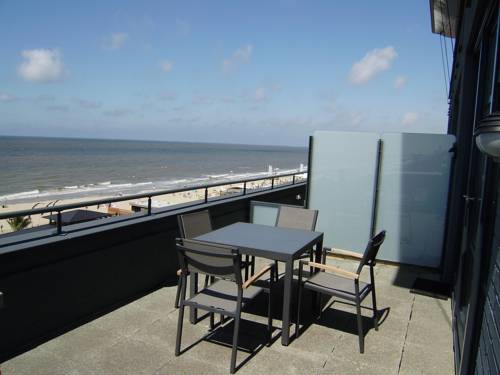 Imagen de la habitación del Hotel Poort Beach Apartments. Foto 6