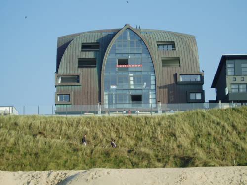 Imagen de la habitación del Hotel Poort Beach Apartments. Foto 7