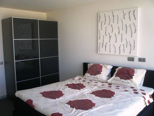 Imagen de la habitación del Hotel Poort Beach Apartments. Foto 8