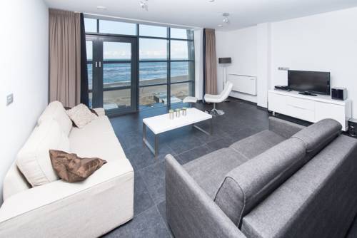 Imagen de la habitación del Hotel Poort Beach Apartments. Foto 9