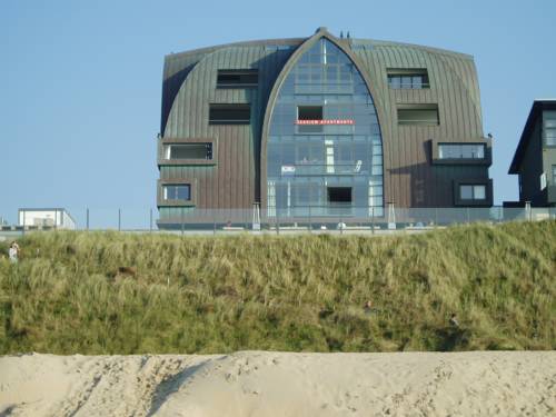 Imagen de la habitación del Hotel Poort Beach Apartments. Foto 11
