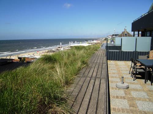 Imagen de la habitación del Hotel Poort Beach Apartments. Foto 15