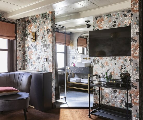 Imagen de la habitación del Hotel Poorter Boutique. Foto 13