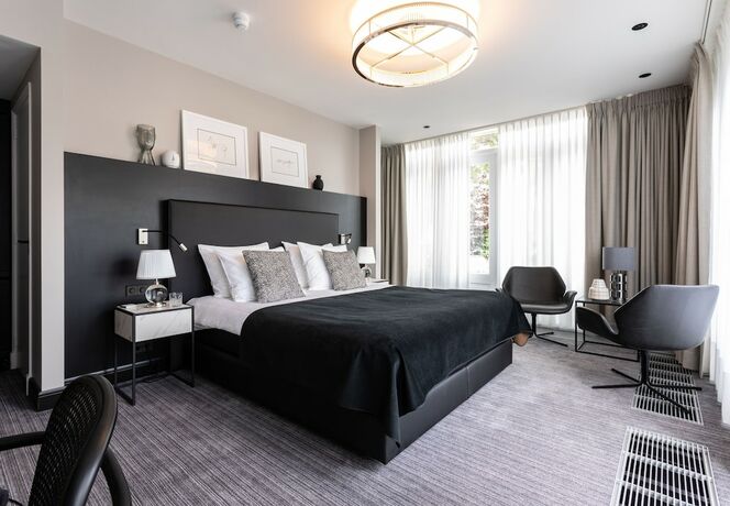 Imagen de la habitación del Hotel Poorter Boutique. Foto 15
