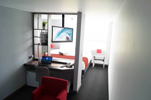 Imagen de la habitación del Hotel Pop Art Tocancip&aacute; Y Centro De Convenciones. Foto 2