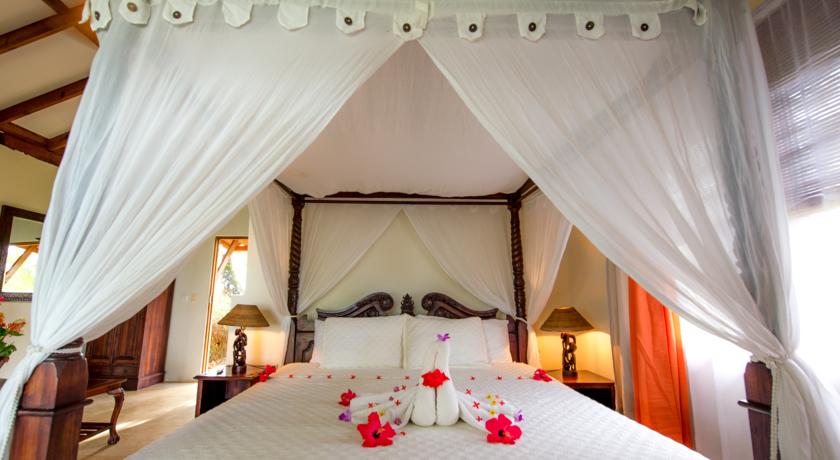 Imagen de la habitación del Hotel Popa Paradise Beach Resort. Foto 4