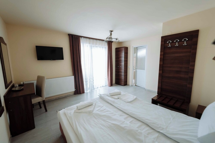 Imagen de la habitación del Hotel Popasul Montan. Foto 3