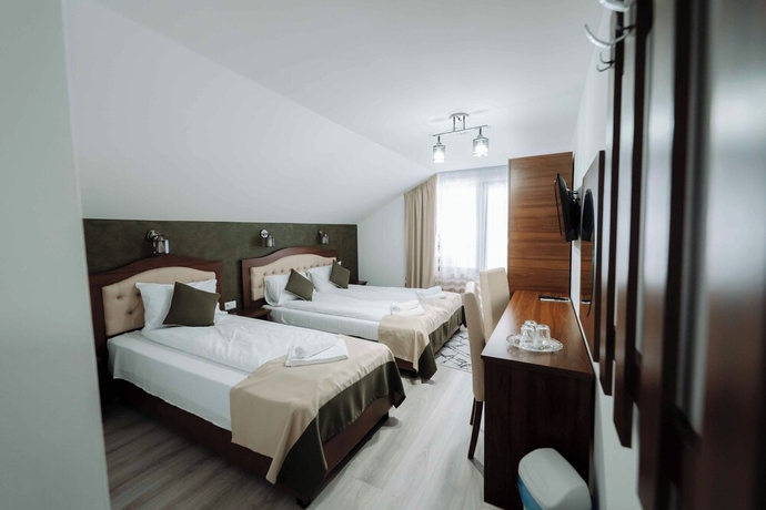 Imagen de la habitación del Hotel Popasul Montan. Foto 5