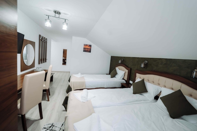 Imagen de la habitación del Hotel Popasul Montan. Foto 8