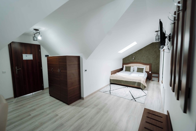 Imagen de la habitación del Hotel Popasul Montan. Foto 10