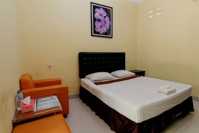 Imagen de la habitación del Hotel Popi Pondok Pisang. Foto 2