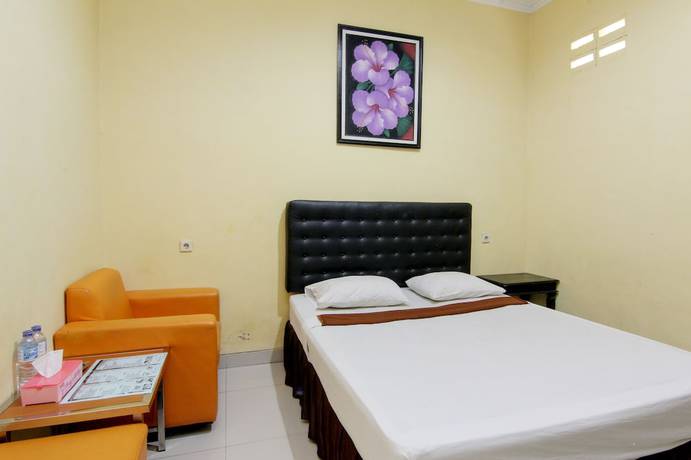 Imagen de la habitación del Hotel Popi Pondok Pisang. Foto 3