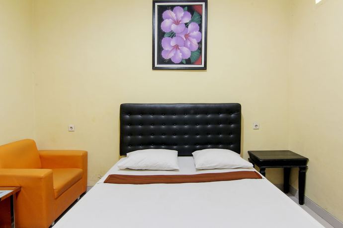 Imagen de la habitación del Hotel Popi Pondok Pisang. Foto 5