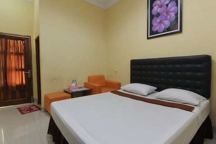 Imagen de la habitación del Hotel Popi Pondok Pisang. Foto 6