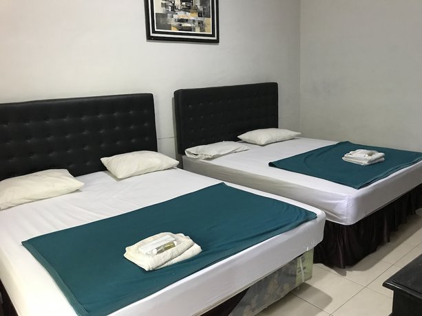Imagen de la habitación del Hotel Popi Pondok Pisang. Foto 7