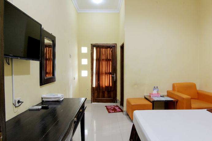 Imagen de la habitación del Hotel Popi Pondok Pisang. Foto 9