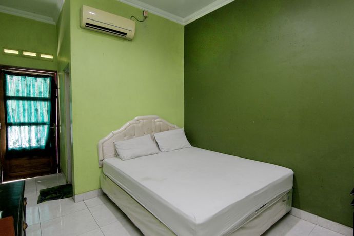 Imagen de la habitación del Hotel Popi Pondok Pisang. Foto 10