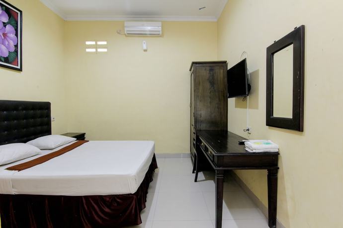 Imagen de la habitación del Hotel Popi Pondok Pisang. Foto 11