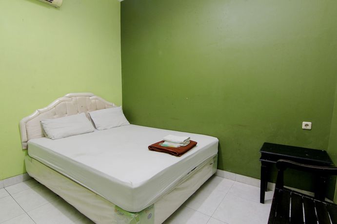 Imagen de la habitación del Hotel Popi Pondok Pisang. Foto 12