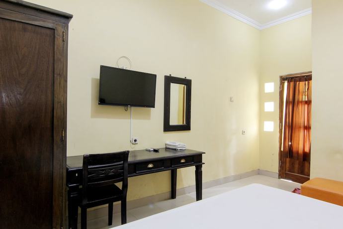Imagen de la habitación del Hotel Popi Pondok Pisang. Foto 13