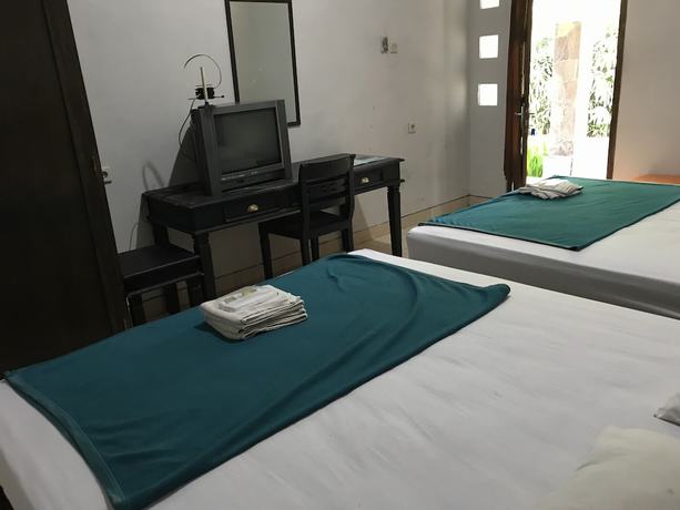 Imagen de la habitación del Hotel Popi Pondok Pisang. Foto 14