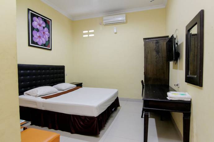 Imagen de la habitación del Hotel Popi Pondok Pisang. Foto 15