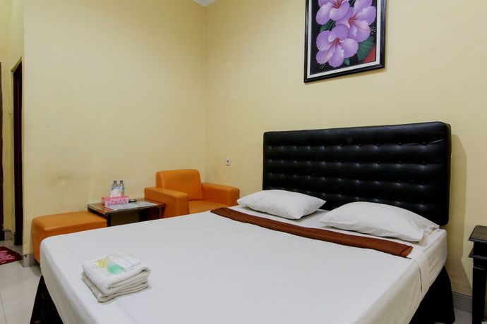 Imagen de la habitación del Hotel Popi Pondok Pisang. Foto 16