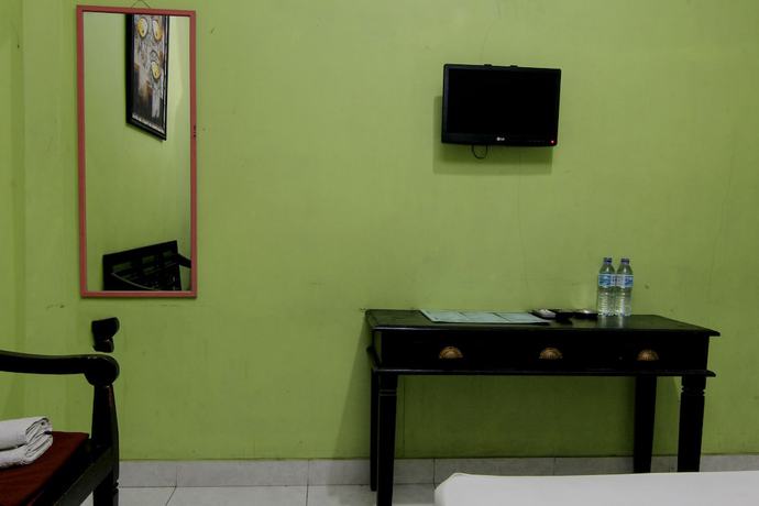 Imagen de la habitación del Hotel Popi Pondok Pisang. Foto 17