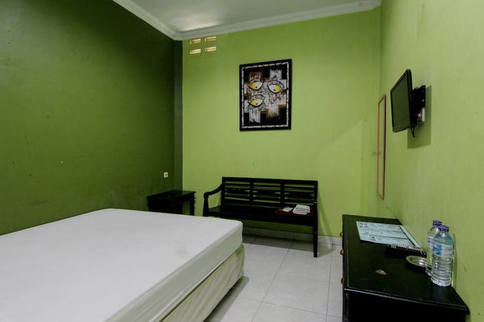 Imagen de la habitación del Hotel Popi Pondok Pisang. Foto 18