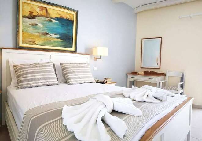 Imagen de la habitación del Hotel Popi Studios. Foto 17