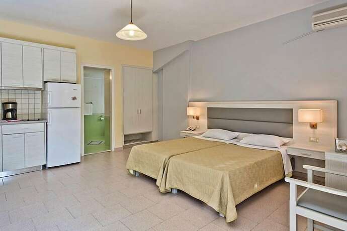 Imagen de la habitación del Hotel Popi Studios. Foto 18