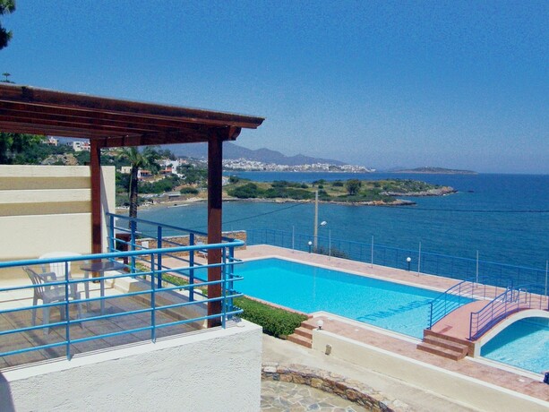 Imagen de la habitación del Hotel Poppy Villas. Foto 16