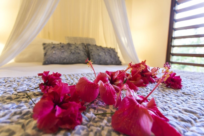 Imagen de la habitación del Hotel Poppys On The Lagoon. Foto 5