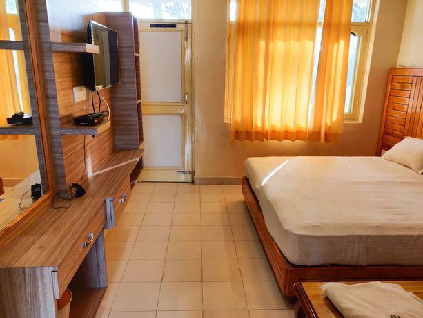 Imagen de la habitación del Hotel Pops and Restaurant. Foto 7