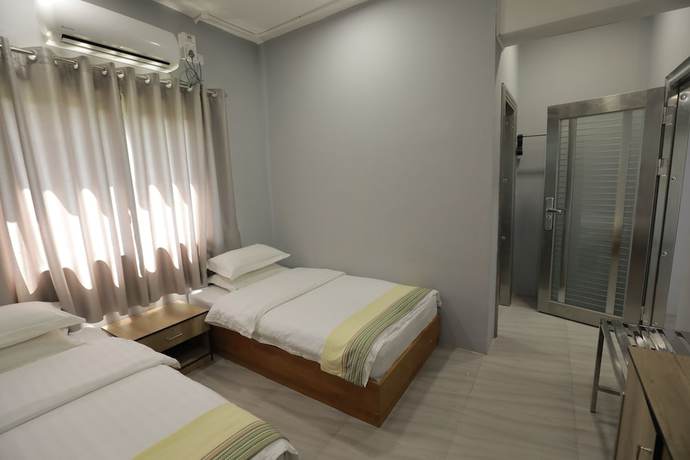 Imagen de la habitación del Hotel Popular Kyaik Hto. Foto 4