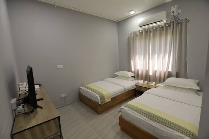 Imagen de la habitación del Hotel Popular Kyaik Hto. Foto 13