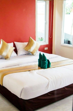 Imagen de la habitación del Hotel Popular Lanta Resort. Foto 12