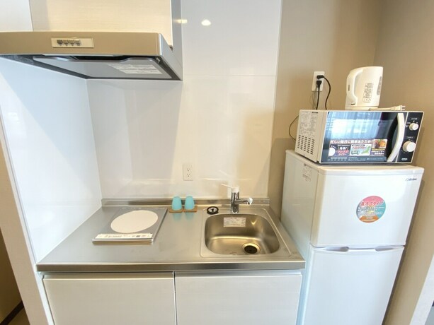 Imagen de la habitación del Hotel Popular Makiminato. Foto 25