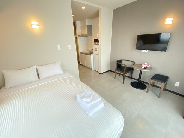 Imagen de la habitación del Hotel Popular Makiminato. Foto 32