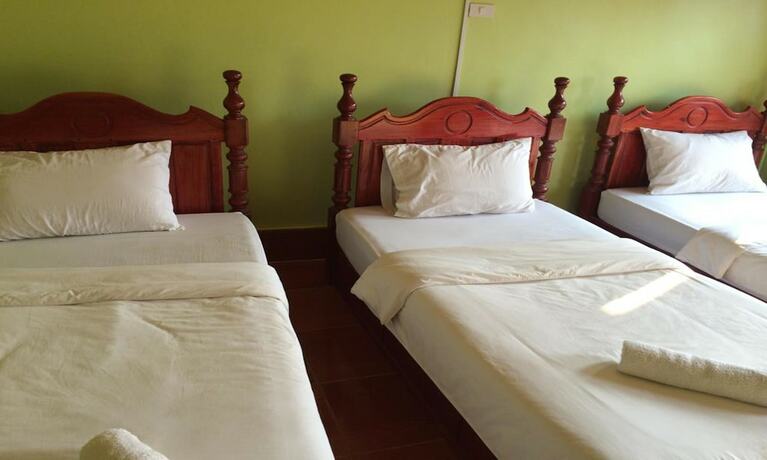 Imagen de la habitación del Hotel Popular View Guesthouse. Foto 17
