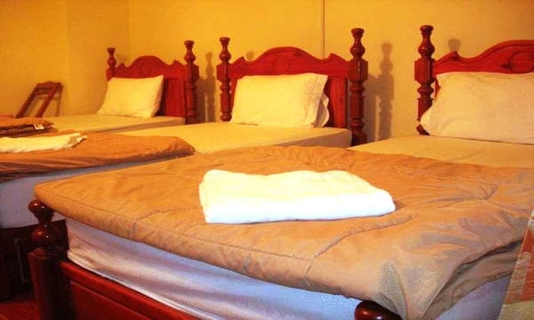 Imagen de la habitación del Hotel Popular View Guesthouse. Foto 23