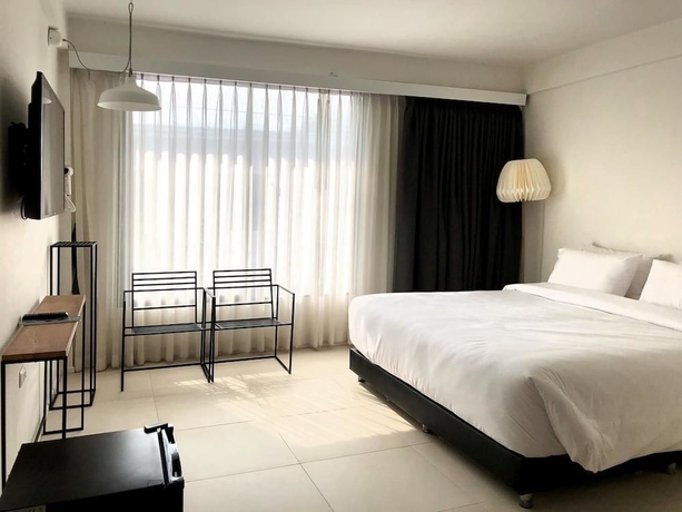 Imagen de la habitación del Hotel Por Santitham. Foto 2