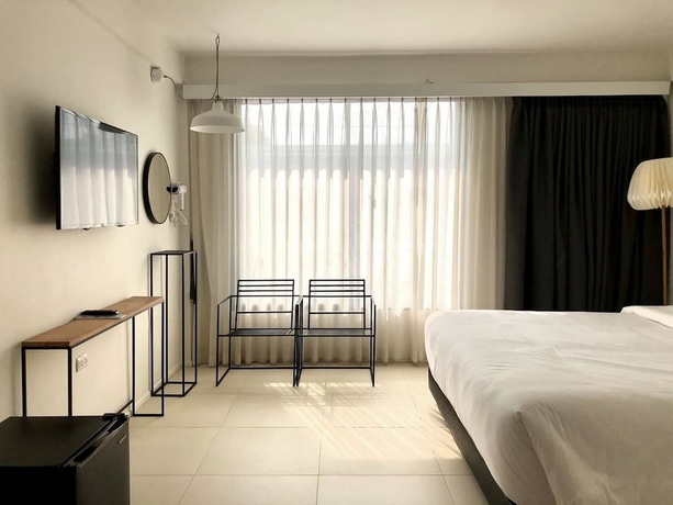 Imagen de la habitación del Hotel Por Santitham. Foto 3