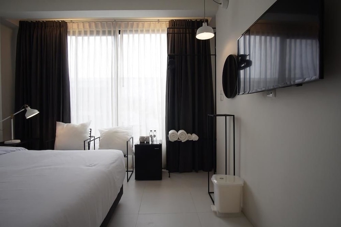 Imagen de la habitación del Hotel Por Santitham. Foto 4