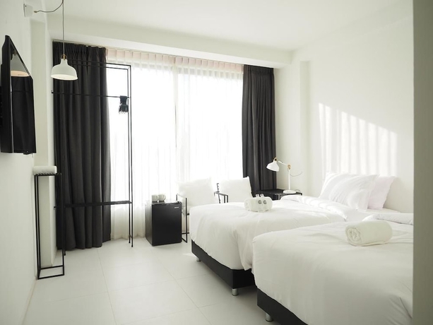 Imagen de la habitación del Hotel Por Santitham. Foto 6