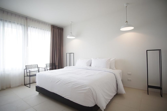 Imagen de la habitación del Hotel Por Santitham. Foto 8