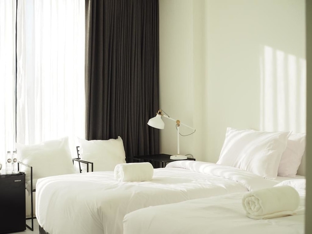 Imagen de la habitación del Hotel Por Santitham. Foto 12