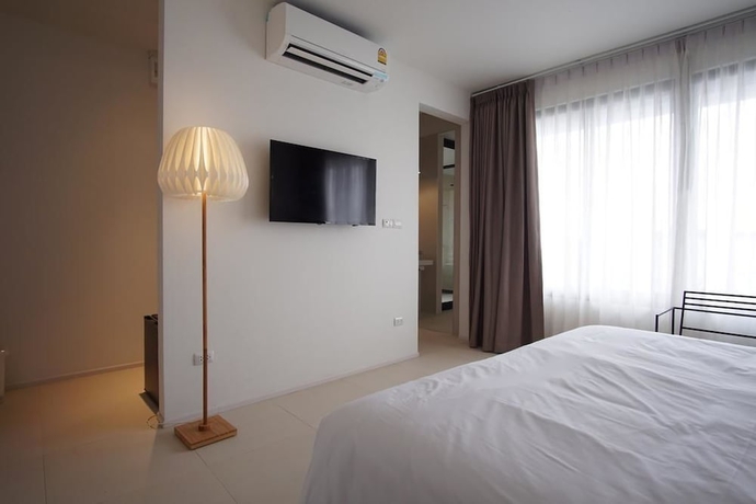 Imagen de la habitación del Hotel Por Santitham. Foto 14