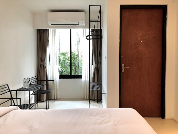 Imagen de la habitación del Hotel Por Santitham. Foto 15