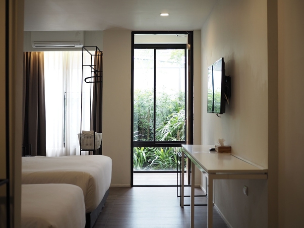 Imagen de la habitación del Hotel Por Santitham. Foto 17